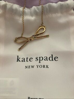 kate spade gold bow necklace with iridescent stones